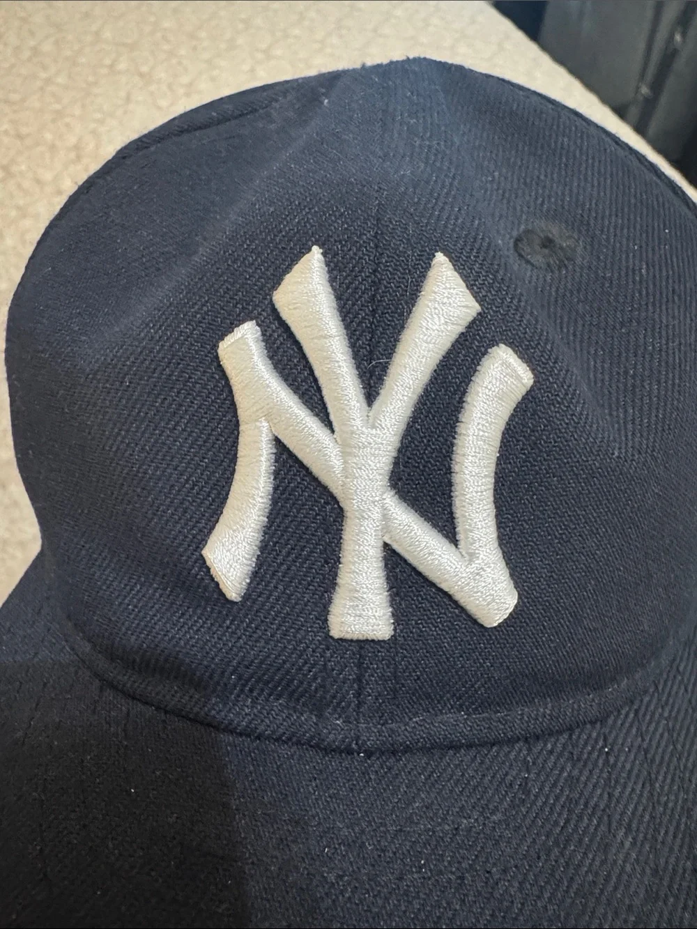 New Era Black Cap with White NY Embroidered Logo